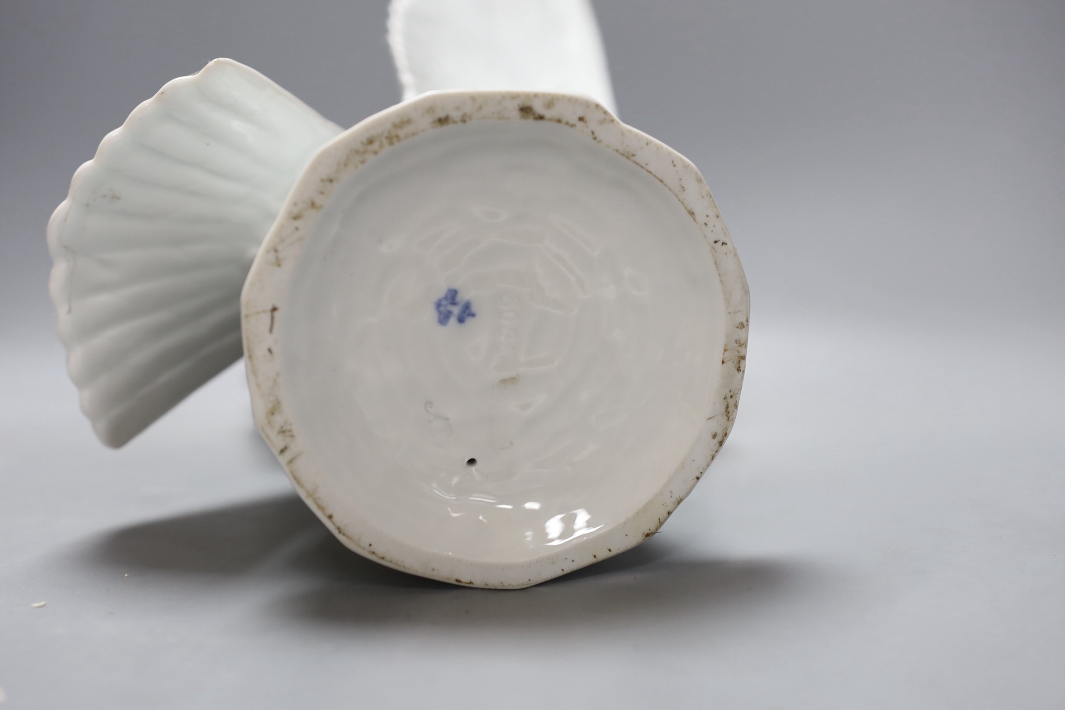 A modern Dresden porcelain model of a perching falcon, 37cms high.